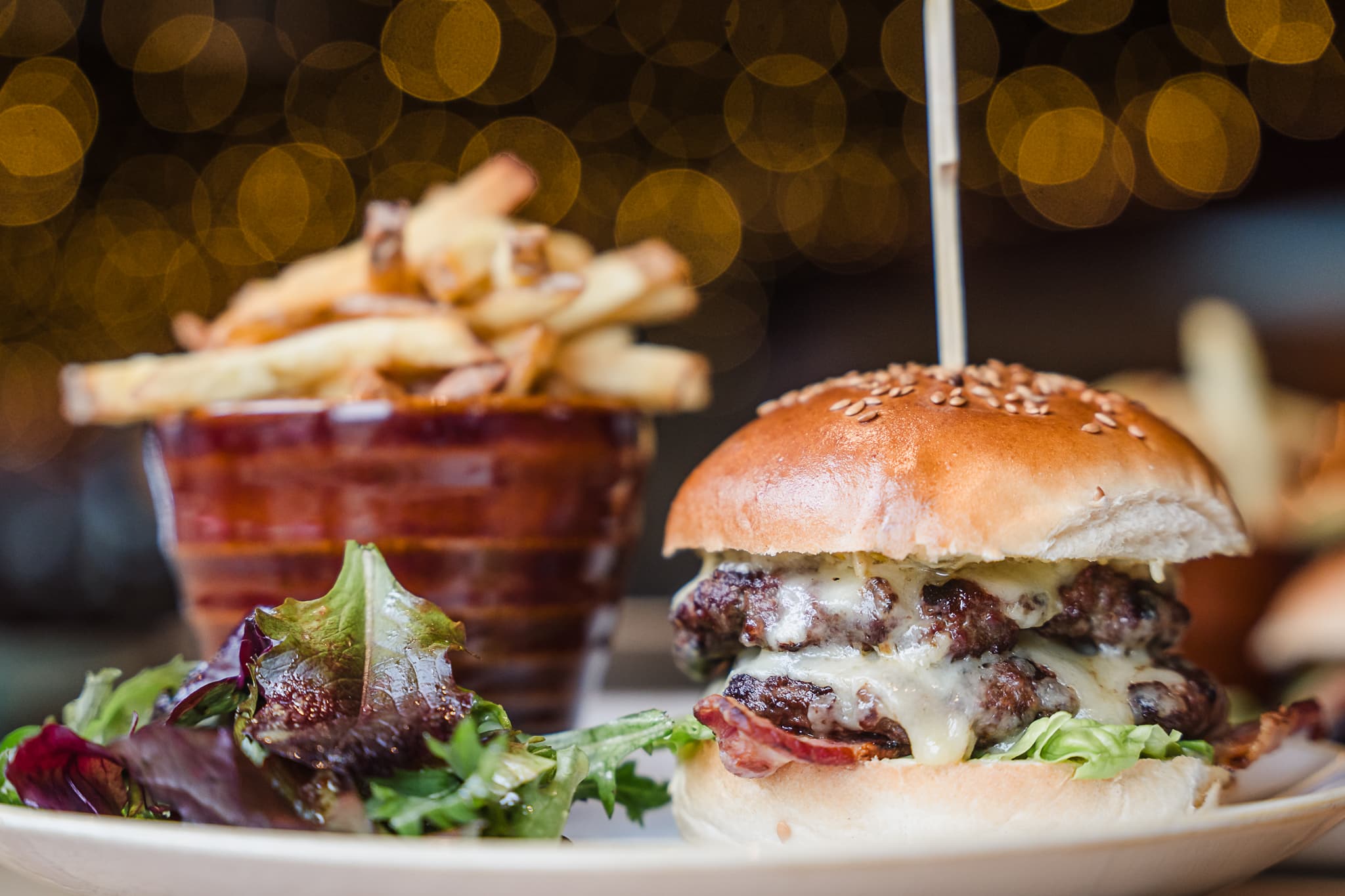 20% off mains, promotional photo of the Sheppey Burger